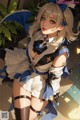 Anime girl in a blue and white outfit posing for a picture.